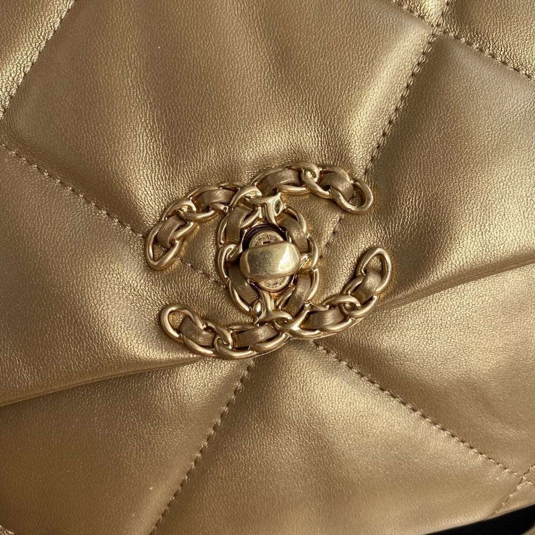 CHANEL 19 Maxi Flap Bag Gold
